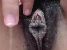 An Exotic Hairy Sooty Lips Pussy